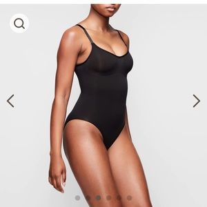 NIB Skims bodysuit brief with snaps.